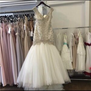 Gently worn like new couture wedding dress, size Large